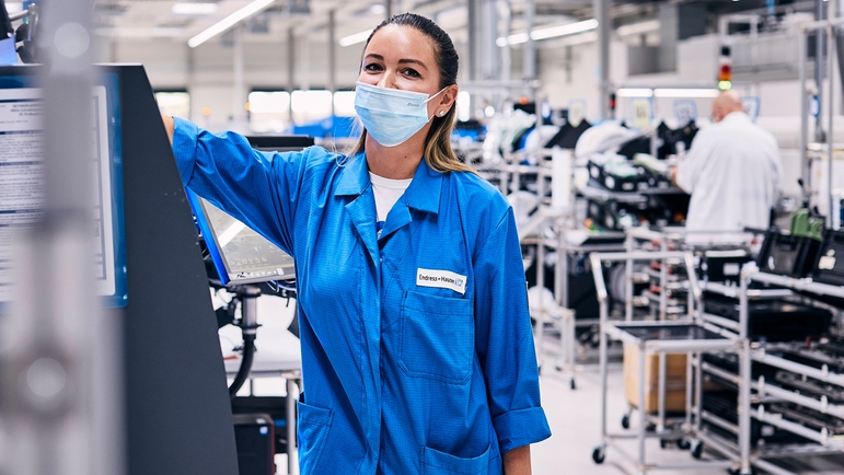 Woman in production hall